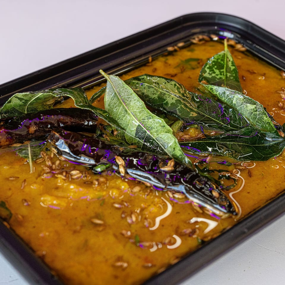 Indian food with curry leaves
